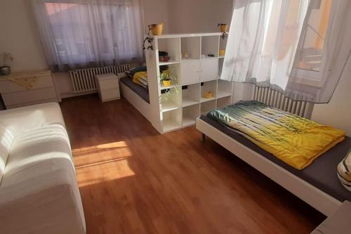 Ένα ή περισσότερα κρεβάτια σε δωμάτιο στο Ferienwohnung Dürr