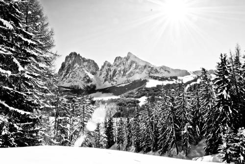 a black and white photo of a snow covered mountain at Haus Fulterer in Siusi
