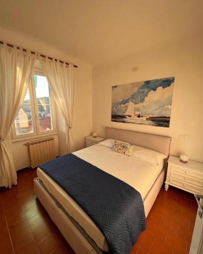 Ένα ή περισσότερα κρεβάτια σε δωμάτιο στο Casa Le Grazie