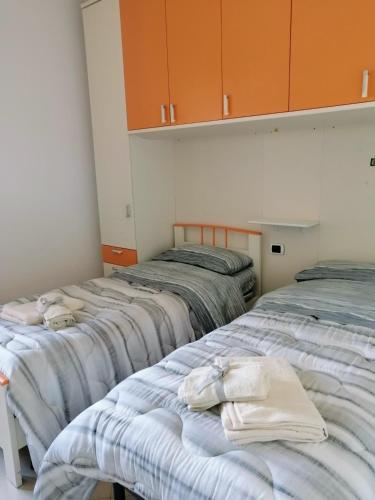 Una cama o camas en una habitación de B&B Nausica