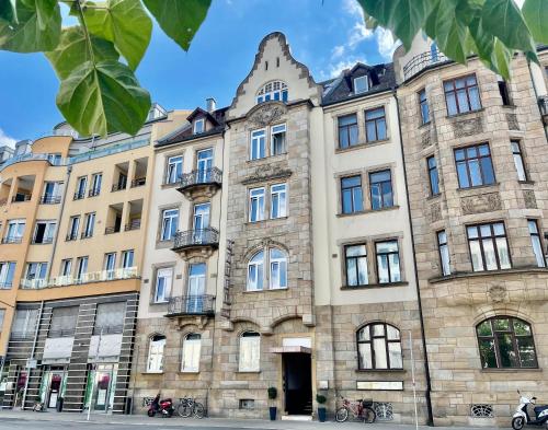 an old building in the city of lyon at Hotel Central in Bamberg