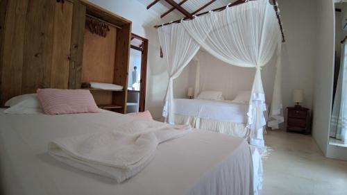casa curuipe praiaにあるベッド