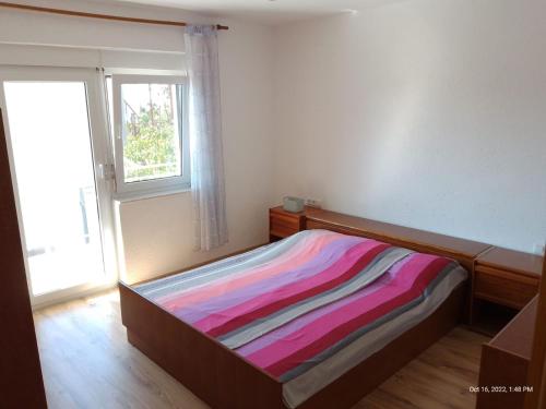 Posteľ alebo postele v izbe v ubytovaní Apartman Tomić - Copacabana Beach Okrug Gornji