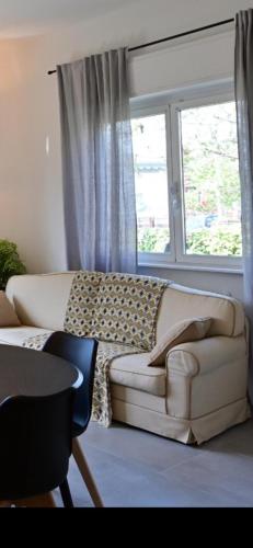 Un lugar para sentarse en Suite Dalmine
