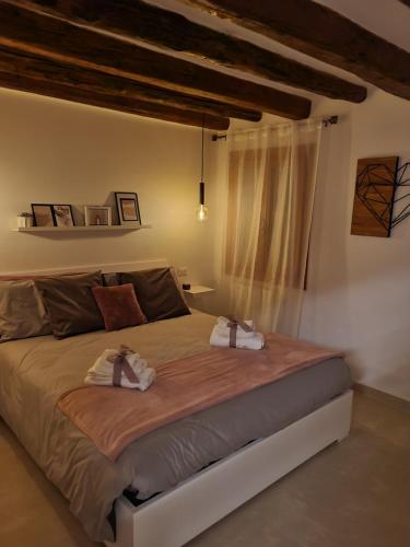 Кровать или кровати в номере CA' SEBASTIANO