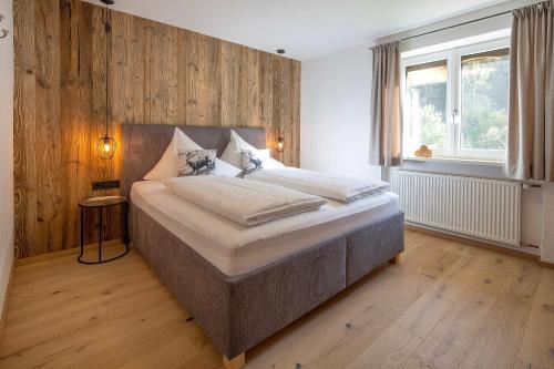 Postel nebo postele na pokoji v ubytování Buchberg Apartments, Ferienwohnung