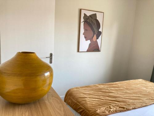 Katil atau katil-katil dalam bilik di Joli appartement avec vue mer