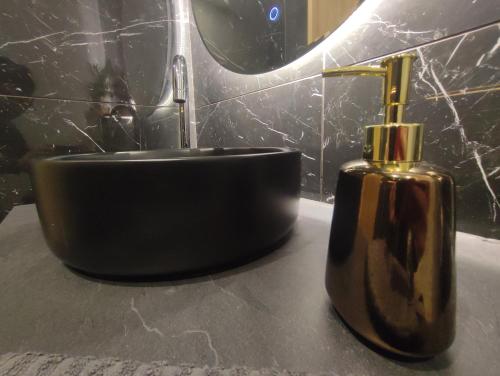 Ein Badezimmer in der Unterkunft Cocon Lux au centre de Voiron
