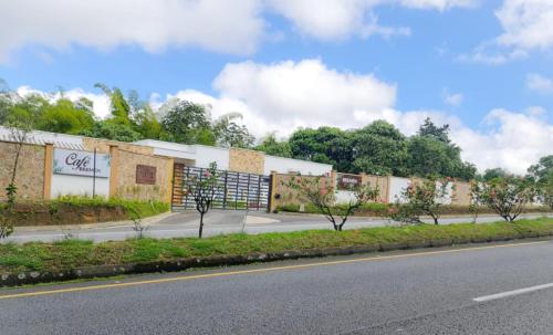 a rendering of a building on the side of a road at Casa Hotel Bremen in Circasia