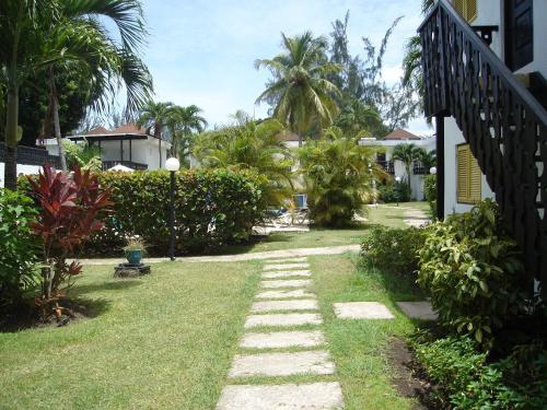 a path through the yard of a house at 213 Golden Grove, Rockley in Bridgetown