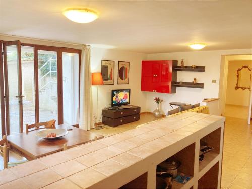 a kitchen with a counter top in a room at Deliziosa Villa Panoramica in Campagnano di Roma