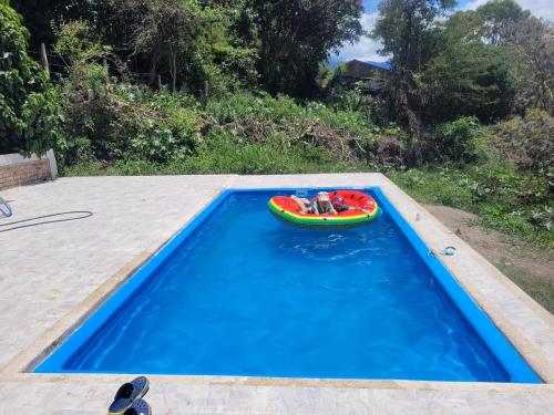 Bazén v ubytování Casa de Campo Cattleya Soatá Boyacá nebo v jeho okolí
