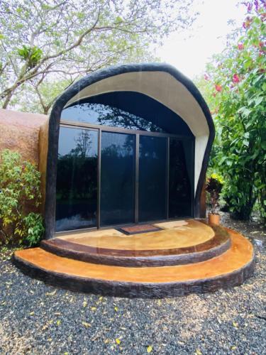 a circular building with a large window at Wellness Park CR in Fortuna