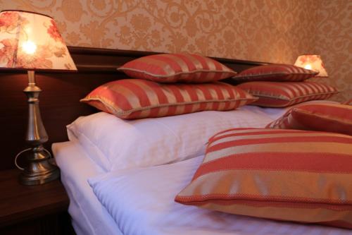 Ένα ή περισσότερα κρεβάτια σε δωμάτιο στο Hotel Kopernik