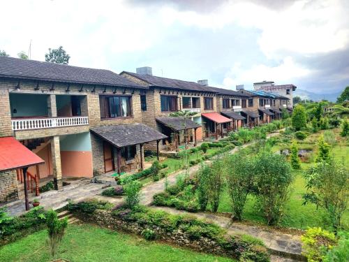 a row of houses in a village at Himalayan Deurali Resort in Pokhara