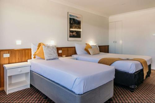 Katil atau katil-katil dalam bilik di Outback Motel Mt Isa