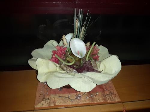 a bouquet of flowers sitting on top of a table at Albergo Sonia in Florence
