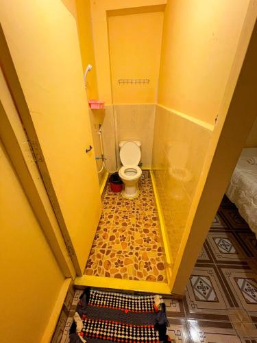 an overhead view of a bathroom with a toilet at Sweet View Guesthouse in Koh Rong