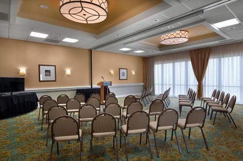 a conference room with chairs and a podium at Breakers Resort Hotel in Myrtle Beach