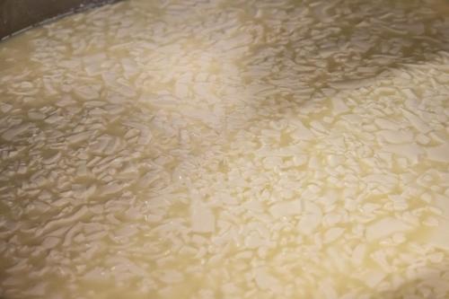 a close up of rice in a pot of water at Starkenfeldhütte in Rodengo