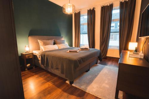 Katil atau katil-katil dalam bilik di Cozy Appartement in Wilhelmshaven - Zentrumsnah