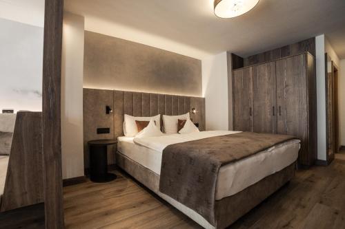 Postel nebo postele na pokoji v ubytování Freina Mountain Lifestyle Hotel