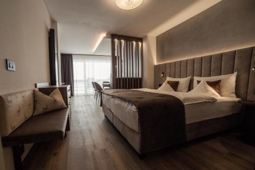Postel nebo postele na pokoji v ubytování Freina Mountain Lifestyle Hotel