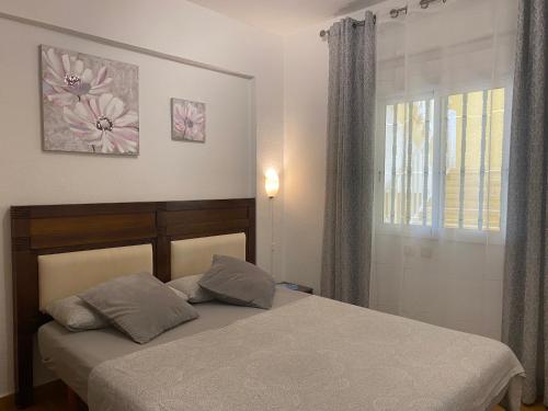 Postel nebo postele na pokoji v ubytování Ocean View Apartment at the beach Playa de La Arena