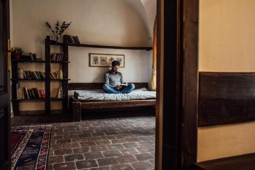 Postel nebo postele na pokoji v ubytování Residence Thunovska