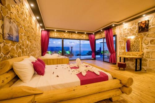 a bedroom with a large bed in a room at Casa Dia in Patara