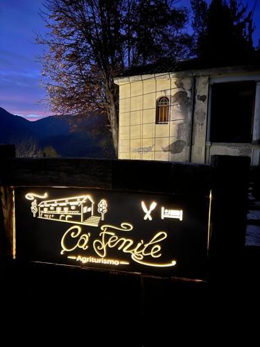 a sign that says ac impulse in front of a building at AGRITURISMO CA' FENILE in Alzano Lombardo