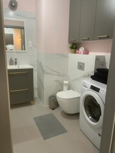 Koupelna v ubytování Apartament KARMEL