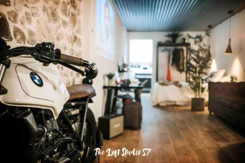 a motorcycle parked in a living room with a bride at The Loft Studio 57 - VUT.3352AS in Ribadesella
