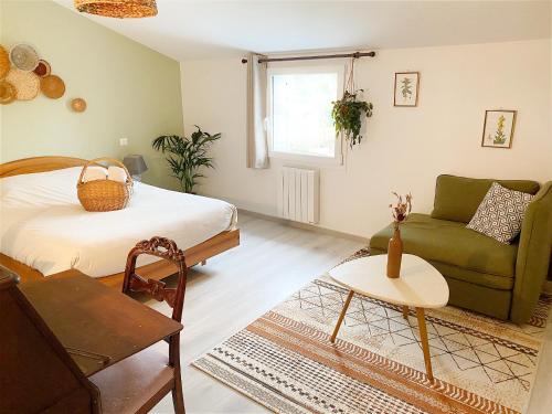 Postel nebo postele na pokoji v ubytování L'Autre Rivière - Chambres d'hôtes