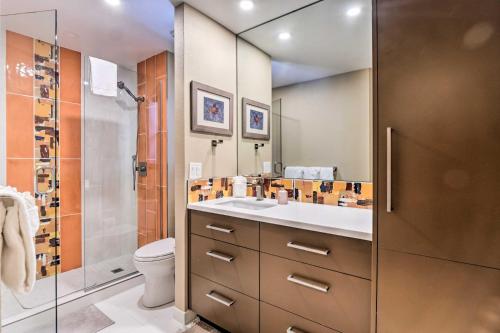 a bathroom with a sink and a toilet and a shower at Tasteful Mountain Getaway on Frisco Bike Path in Frisco