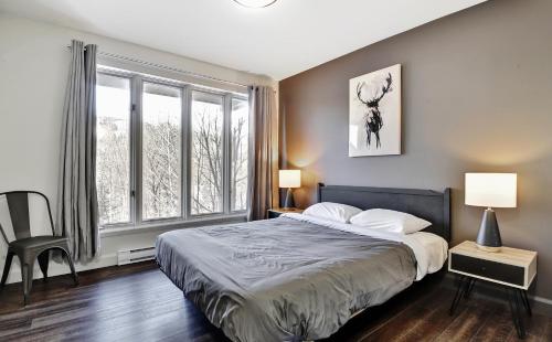 Ένα ή περισσότερα κρεβάτια σε δωμάτιο στο 569 chemin du Hibou