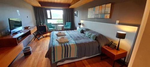 Кровать или кровати в номере Boutique Hotel & Spa Bosque del Nahuel