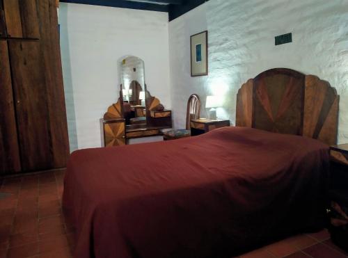 Katil atau katil-katil dalam bilik di Casa del Aguacate Cumbaya - Tumbaco