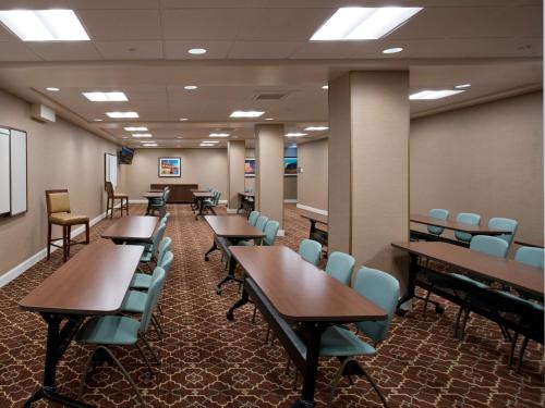 a classroom with desks and chairs in a room at Staybridge Suites Baltimore - Inner Harbor by IHG in Baltimore