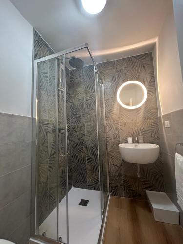 a bathroom with a shower and a sink at Civico 28 in Pescara