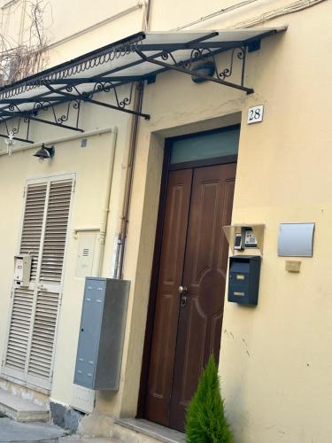 a door to a house with a mailbox next to it at Civico 28 in Pescara