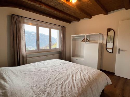 Postel nebo postele na pokoji v ubytování Casa Campanula
