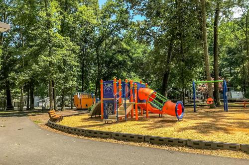 a playground with a slide in a park at 5 Whitecap in Ocean Pines