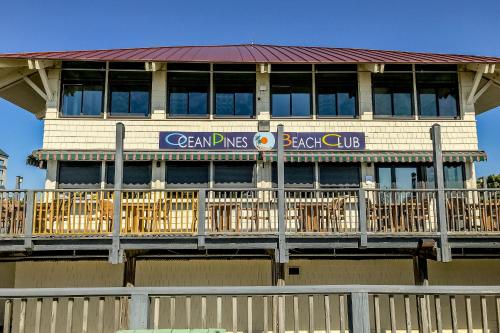 a building with a fence in front of it at 5 Whitecap in Ocean Pines