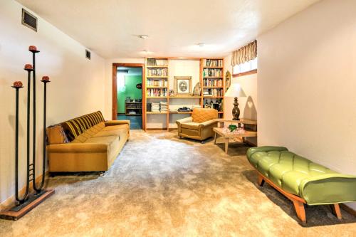a living room with a couch and a chair at Bright Springer House with Hammock and Orchard Views! in Springer