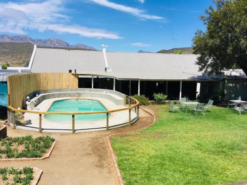 The swimming pool at or close to Klaarstroom Hotel