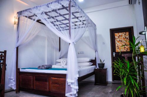 Voodi või voodid majutusasutuse Gem Light Guest House toas