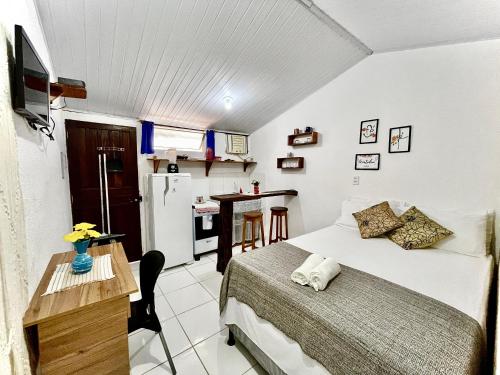 TV a/nebo společenská místnost v ubytování FLATS VASCONCELOS