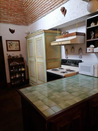 Η κουζίνα ή μικρή κουζίνα στο La Casa de la Abuela