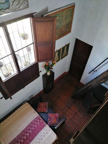 Ένα ή περισσότερα κρεβάτια σε δωμάτιο στο La Casa de la Abuela